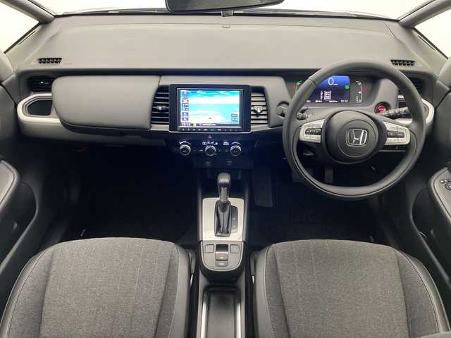 ホンダ フィット e:HEVホーム 宮崎県 2022(令4)年 2.9万km クリスタルブラックパール 禁煙車/ホンダセンシング/純正8型ナビTV/（Gathers/VXM-215VFEi/CD/DVD/Bluetooth/フルセグTV)/純正バックカメラ/純正前後ドライブレコーダー/純正OPエアロ/純正OPルーフエンドスポイラー/純正ビルトインETC/純正LEDオートライト/純正LEDフォグ/純正フロアマット/社外16インチアルミ/アダプティブクルーズコントロール/レーンディパーチャーアラート/オートマチックハイビーム/クリアランスソナー/電子パーキング/オートホールド/ウインカードアミラー/オートエアコン/ハーフレザーシート/本革巻ハンドル/スマートキー/プッシュエンジンスタート/スペアキー/新車時保証書/取扱い説明書