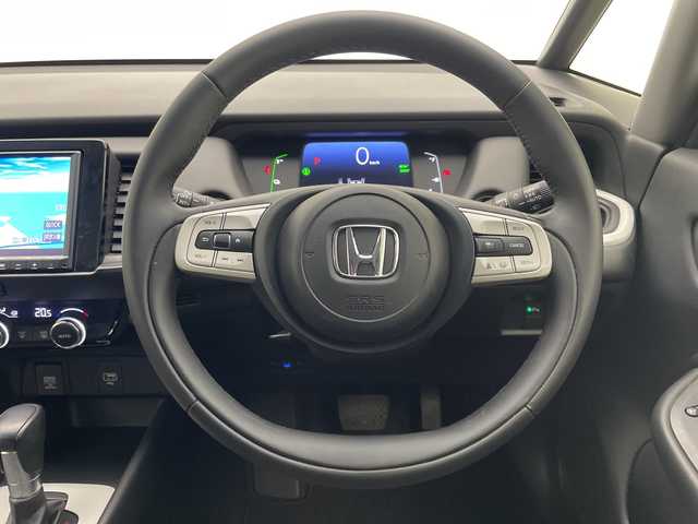 ホンダ フィット e:HEVホーム 宮崎県 2022(令4)年 2.9万km クリスタルブラックパール 禁煙車/ホンダセンシング/純正8型ナビTV/（Gathers/VXM-215VFEi/CD/DVD/Bluetooth/フルセグTV)/純正バックカメラ/純正前後ドライブレコーダー/純正OPエアロ/純正OPルーフエンドスポイラー/純正ビルトインETC/純正LEDオートライト/純正LEDフォグ/純正フロアマット/社外16インチアルミ/アダプティブクルーズコントロール/レーンディパーチャーアラート/オートマチックハイビーム/クリアランスソナー/電子パーキング/オートホールド/ウインカードアミラー/オートエアコン/ハーフレザーシート/本革巻ハンドル/スマートキー/プッシュエンジンスタート/スペアキー/新車時保証書/取扱い説明書