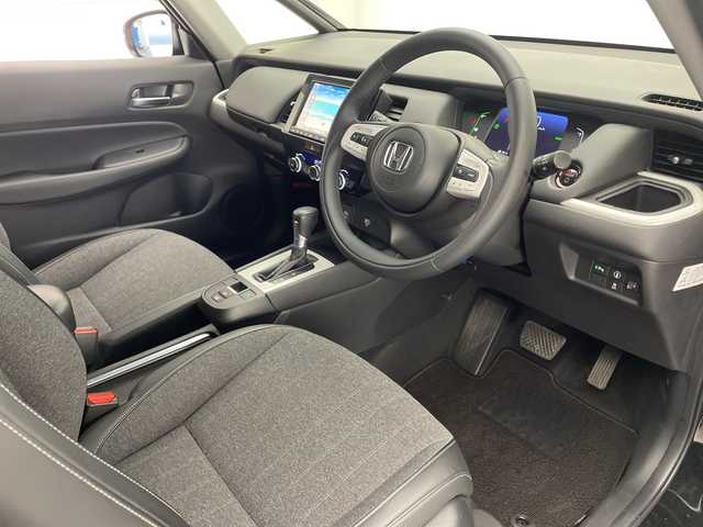 ホンダ フィット e:HEVホーム 宮崎県 2022(令4)年 2.9万km クリスタルブラックパール 禁煙車/ホンダセンシング/純正8型ナビTV/（Gathers/VXM-215VFEi/CD/DVD/Bluetooth/フルセグTV)/純正バックカメラ/純正前後ドライブレコーダー/純正OPエアロ/純正OPルーフエンドスポイラー/純正ビルトインETC/純正LEDオートライト/純正LEDフォグ/純正フロアマット/社外16インチアルミ/アダプティブクルーズコントロール/レーンディパーチャーアラート/オートマチックハイビーム/クリアランスソナー/電子パーキング/オートホールド/ウインカードアミラー/オートエアコン/ハーフレザーシート/本革巻ハンドル/スマートキー/プッシュエンジンスタート/スペアキー/新車時保証書/取扱い説明書