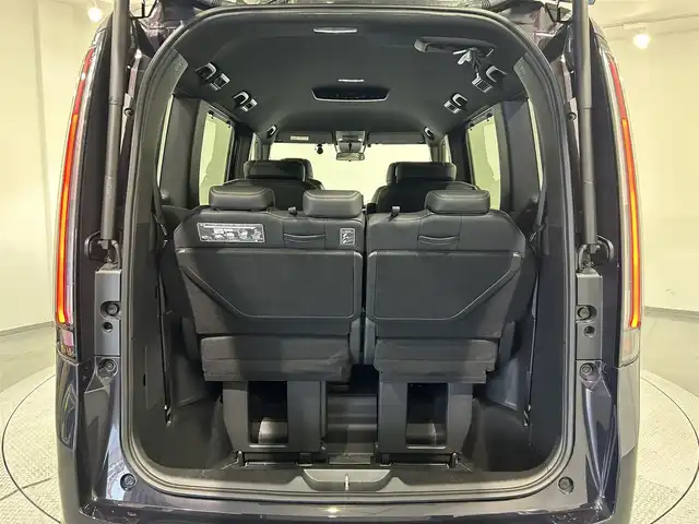 ホンダ ステップワゴン スパーダ eHEV プレミアムライン 愛知県 2022(令4)年 1.7万km トワイライトミストブラックパール 純正9インチナビ/（AM/FM/CD/DVD/USB/Bluetooth/フルセグTV）/両側電動スライドドア/ホンダセンシング/・レーダークルーズコントロール/・レーンキープアシスト/・ブラインドスポットモニター/・パーキングセンサー/・衝突軽減ブレーキ/・標識認識機能/アラウンドビューモニター/LEDヘッドライト/1列目・2列目シートヒーター/ETC/バックカメラ/ドライブレコーダー/ブラインドスポットモニター/電動リアゲート/プッシュスタート/コーナーセンサー/パドルシフト/2列目オットマン/スマートキー/ミュージックサーバー/ミュージックプレイヤー接続/オートライト