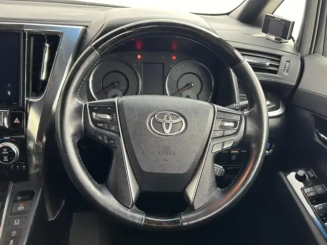 トヨタ ヴェルファイア 2.5Z Aエディデョン ゴールデンアイズ 道央・札幌 2017(平29)年 10.4万km ブラック ・ワンオーナー車/・４WD/・寒冷地仕様/・アルパインナビゲーション（EX11V）/　CD/DVD/フルセグ/SD/BT/・アルパイン12.8インチフリップダウンモニター/   （プラズマクラスター付）/・社外ドライブレコーダー前後（ZDR025）/・ビルトインETC/・レーダー探知機/・両側パワースライドドア/・オートブレーキホールド/・レーダークルーズコントロール/・インテリジェントクリアランスソナー/・ハーフレザーシート/・F/Rフォグランプ/・リモートスタート一体型スマートキー/・プッシュスタート/・スペアキー１本/・純正AW18インチ＋夏タイヤ/・社外AW16インチ＋冬タイヤ積込/・保証書付き/・取説付き/・MTモード付AT/・電動格納ウィンカーミラー/・ステアリングスイッチ/・nanoe