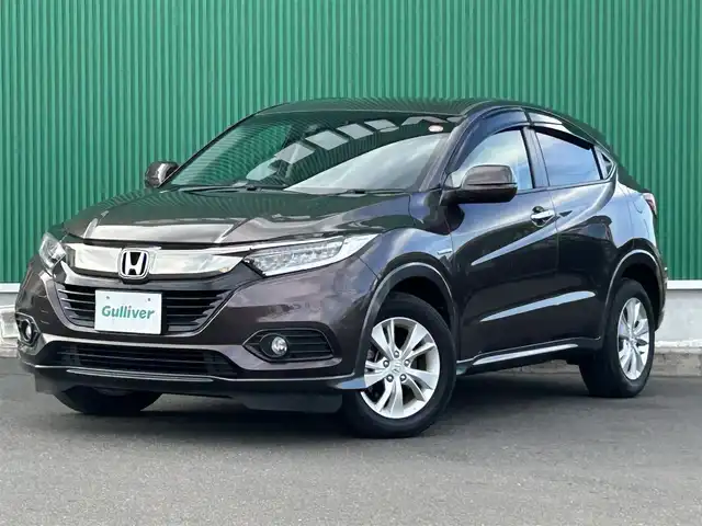 ホンダ ヴェゼル ハイブリッド X ホンダセンシング 宮城県 2019(令1)年 1.9万km オーロラアメジストメタリック ホンダセンシング/●衝突軽減ブレーキ〈CMBS〉/●誤発進抑制機能/●歩行者事故低減ステアリング/●路外逸脱抑制機能/●ACC〈アダプティブ・クルーズ・コントロール〉/●LKAS〈車線維持支援システム〉/●先行車発進お知らせ機能/●標識認識機能/純正ナビ（VXM-194VFi）/・CD/DVD/・Bluetooth/・フルセグTV/・USB/HDMI/バックカメラ/ビルトインETC/ドライブレコーダー/革巻きステアリング/パドルシフト/ステアリングスイッチ/電動パーキングブレーキ/ブレーキホールド/LEDヘッドランプ/フォグランプ/オートライト/スマートキー＆プッシュスタート/スペアキー/純正エンジンスターター/電動格納ミラー/純正16インチアルミホイール/純正フロアマット/ドアバイザー/W/サイド/カーテンエアバッグ