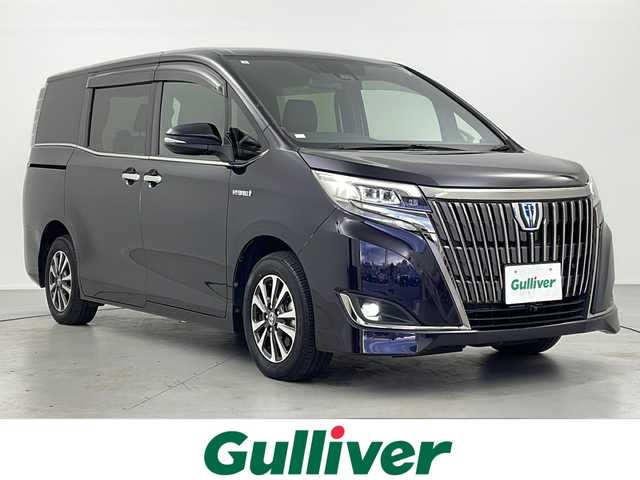 トヨタ エスクァイア ハイブリッド Gi プレミアムパッケージ ブラックテーラード 岐阜県 2019(令1)年 3.2万km スパークリングブラックパールクリスタルシャイン 純正10型ナビ/CD/DVD/Bluetooth/SD/USB/AM/FM/フルセグTV/プリクラッシュセーフティ/レーントレーシングアシスト/クリアランスソナー/先行車発信通知/パーキングサポートブレーキ/バックカメラ/ビルトインETC2.0/両側電動スライドドア/エンジンスターター/スマートキー/シートヒーター/ステアリングヒーター/クルーズコントロール/LEDヘッドライト/純正フロアマット/純正ドアバイザー