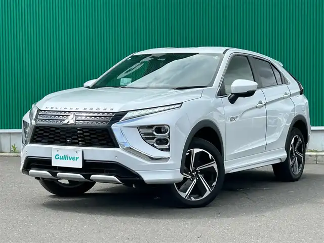 三菱 エクリプス クロス ＰＨＥＶ P 宮城県 2020(令2)年 8.3万km ホワイトダイヤモンド e-アシスト/・衝突被害軽減ブレーキシステム/・車線逸脱警報システム/・レーダークルーズコントロール/・オートマチックハイビーム/・誤発進抑制機能/・後側方車両検知警報システム/・後退時車両検知警報システム/スマートフォン連携ナビゲーション/・Bluetooth/・フルセグTV/マルチアラウンドモニター/ETC/AC100V/1500W電源/ヘッドアップディスプレイ/ハーフレザーシート/パワーシート/シートヒーター/ステアリングヒーター/LEDヘッドランプ/LEDフロントフォグランプ/オートライト/スマートキー＆プッシュスタート/電動格納ミラー/純正１８インチアルミホイール/純正フロアマット/スペアキー