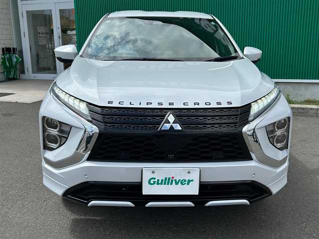 三菱 エクリプス クロス ＰＨＥＶ P 宮城県 2020(令2)年 8.3万km ホワイトダイヤモンド e-アシスト/・衝突被害軽減ブレーキシステム/・車線逸脱警報システム/・レーダークルーズコントロール/・オートマチックハイビーム/・誤発進抑制機能/・後側方車両検知警報システム/・後退時車両検知警報システム/スマートフォン連携ナビゲーション/・Bluetooth/・フルセグTV/マルチアラウンドモニター/ETC/AC100V/1500W電源/ヘッドアップディスプレイ/ハーフレザーシート/パワーシート/シートヒーター/ステアリングヒーター/LEDヘッドランプ/LEDフロントフォグランプ/オートライト/スマートキー＆プッシュスタート/電動格納ミラー/純正１８インチアルミホイール/純正フロアマット/スペアキー