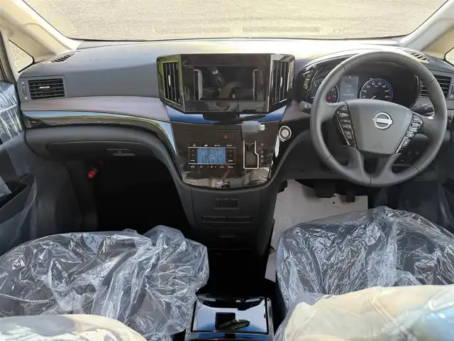 日産 エルグランド 250ハイウェイスターS 兵庫県 2025(令7)年 0.1千km ピュアホワイトパール アラウンドビューモニタ-/BSM/レーダークルコン/レーンキープ/オートハイビーム/両側パワースライドドアパワーバックドア/ハーフレザーシート/Ｗエアコン