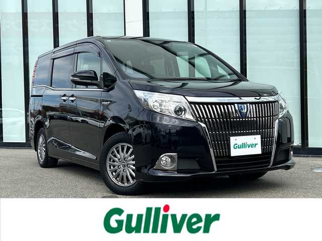 トヨタ エスクァイア ハイブリッド Gi 大阪府 2015(平27)年 4.9万km スパークリングブラックパールクリスタルシャイン 純正9インチナビ/・Bluetooth/フルセグTV/CD/DVD/ラジオ/主要装備/・バックカメラ/・クルーズコントロール/・クリアランスソナー/・アイドリングストップ/・横滑り防止装置/・トラクションコントロール/・両側パワースライドドア/・合皮シート/・シートヒーター/・純正アルミホイール/・純正フロアマット/・LEDヘッドライト/・プッシュスタート/・スマートキー/・ETC