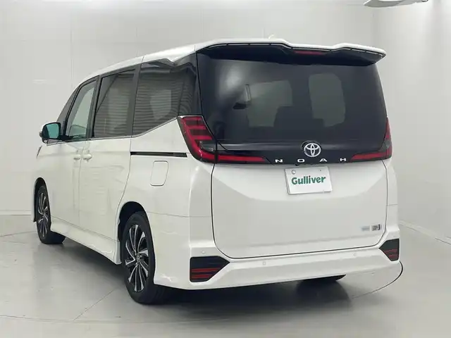 トヨタ ノア ハイブリッド S－Z 茨城県 2024(令6)年 0.5万km ホワイトパールクリスタルシャイン 純正10.5型DA/フルセグ/バックカメラ/純正フリップダウンモニター/快適利便パッケージ/モデリスタフロントグリルキット/モデリスタイルミルーフスポイラー/モデリスタシグネチャーイルミブレード/衝突被害軽減ブレーキ/車線逸脱抑制装置/レーダークルーズコントロール/オートマチックハイビーム/クリアランスソナー/両側電動スライドドア/ETC2.0/AC100V/シートヒーター/純正17インチAW/3眼LEDヘッドライト/スマートキー