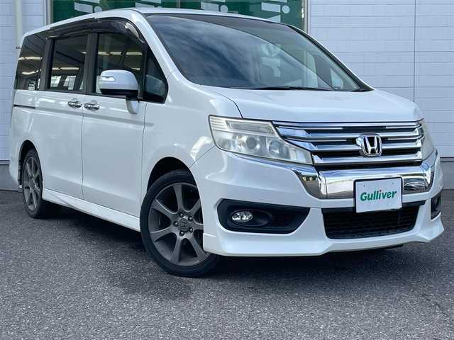 ホンダ ステップワゴン スパーダ Z 新潟県 2013(平25)年 5.3万km ホワイトオーキッドパール メモリナビ/ワンセグテレビ/バックカメラ/フリップダウンモニター/アイドリングストップ/ウィンカーミラー/ドアバイザー/両側パワースライドドア/ETC