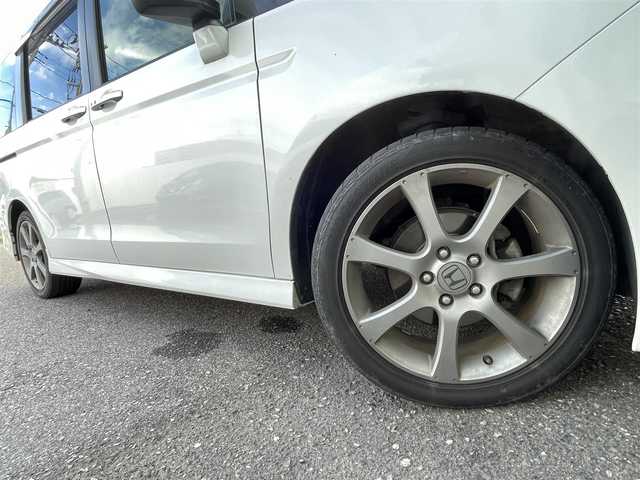 ホンダ ステップワゴン スパーダ Z 新潟県 2013(平25)年 5.3万km ホワイトオーキッドパール メモリナビ/ワンセグテレビ/バックカメラ/フリップダウンモニター/アイドリングストップ/ウィンカーミラー/ドアバイザー/両側パワースライドドア/ETC