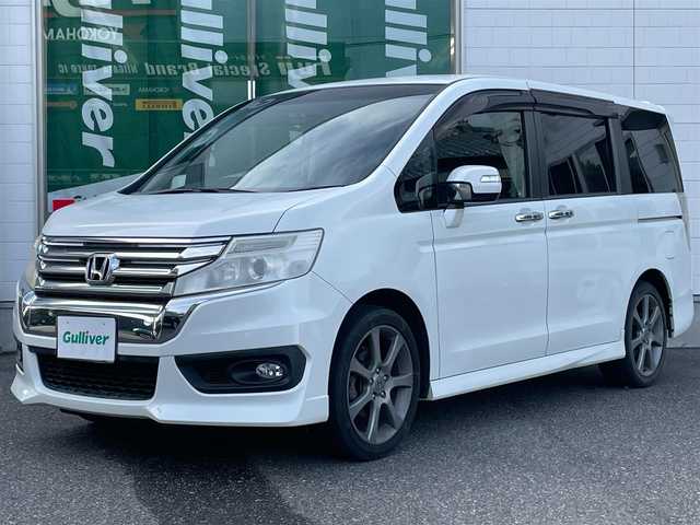 ホンダ ステップワゴン スパーダ Z 新潟県 2013(平25)年 5.3万km ホワイトオーキッドパール メモリナビ/ワンセグテレビ/バックカメラ/フリップダウンモニター/アイドリングストップ/ウィンカーミラー/ドアバイザー/両側パワースライドドア/ETC