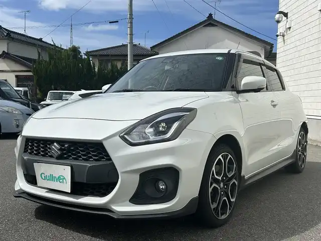 スズキ スイフト スポーツ 山形県 2019(令1)年 7.9万km ピュアホワイトP 純正ナビ/フルセグTV/FM/AM/DVD/Bluetooth/パドルシフト/クルーズコントロール/全方位バックカメラ/横ブレ防止装置/衝突軽減ブレーキ/逸脱防止装置/盗難防止装置/ヒートヒーター（D）/LEDライト/AUTOライト/フォグランプ/純正マット/純正バイザー/USB端子/ETC