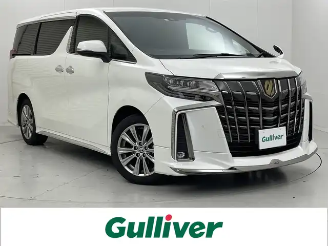 トヨタ アルファード S タイプゴールドⅢ 茨城県 2023(令5)年 1.3万km ホワイトパールクリスタルシャイン 純正9型DAナビ/バックカメラ/フルセグ/CD/DVDデッキ/純正フリップダウンモニター/モデリスタエアロ/デジタルインナーミラー/衝突被害軽減ブレーキ/車線逸脱抑制装置/レーダークルーズコントロール/オートマチックハイビーム/クリアランスソナー/BSM/両側電動スライドドア/ETC/ドラレコ/AC100V/純正17インチAW/LEDヘッドライト/スマートキー