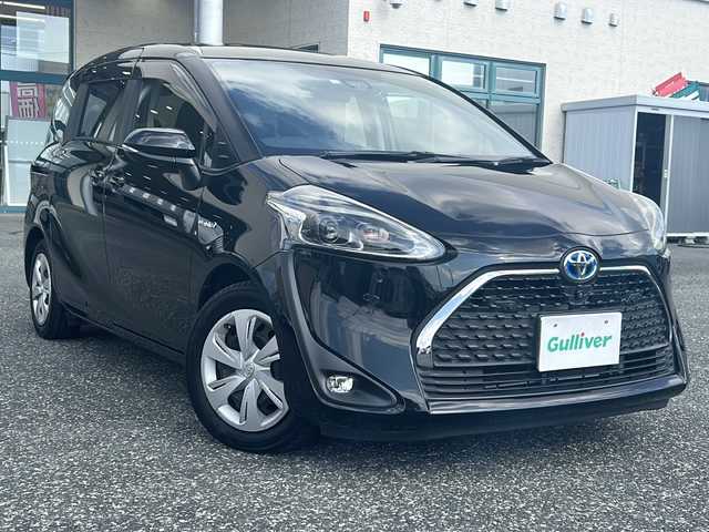 トヨタ シエンタ ハイブリッド G 愛知県 2019(平31)年 8.7万km ブラックマイカ 登録時走行距離86747km/純正7インチSDナビ/(Bluetooth/フルセグTV/DVD)/パラノミックビューモニター/ドラレコ前後/クリアランスソナー/トヨタセーフティーセンス/プリクラッシュセーフティー/レーンディパーチャーアラート/誤発信抑制機能/オートマチックハイビーム/レーダークルーズコントロール/両側パワスラ/R15インチスタッドレスタイヤ×4積み込み/ビルドイン2.0ETC/ステアリングスイッチ/2.1Aアクセサリー×2/純正ドアバイザー/純正フロアマット/プッシュスタート/スマートキー/(スペアキー×1)/取説/保証書