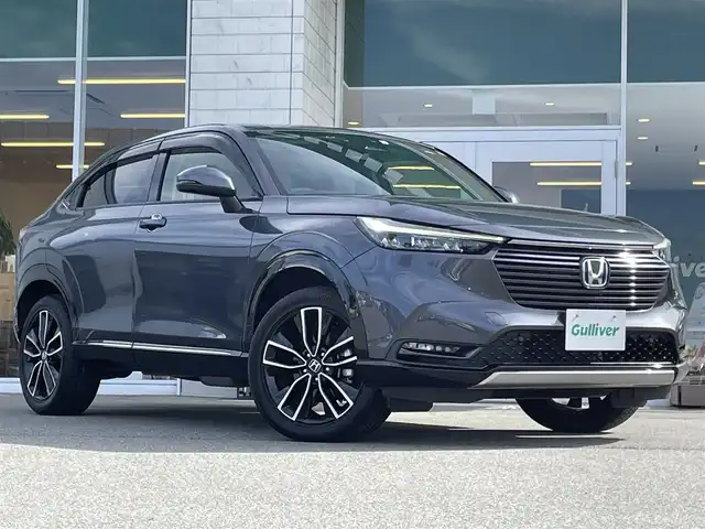 ホンダ ヴェゼル ハイブリッド e:HEV Z 兵庫県 2023(令5)年 3.5万km メテオロイドグレーメタリック 純正ナビ/フルセグTV/Bluetoothオーディオ/CD／DVD/バックカメラ/ステアリングリモコン/クルーズコントロール（追従あり）/パワーバックドア/ハーフレザーシート/シートヒーター/ドアバイザー/純正ゴムマット/パドルシフト/ステアリングヒーター
