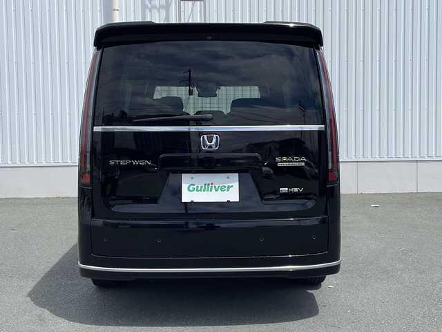 ホンダ ステップワゴン スパーダ eHEV プレミアムライン 三重県 2022(令4)年 3万km クリスタルブラックパール プッシュスタート/電動格納ミラー/横滑り防止/両側パワースライドドア/パワーバックドア/レーンキープアシスト/レーダークルーズコントロール/衝突軽減ブレーキ/パドルシフト/ビルトインETC/ステアリングスイッチ/革巻きステアリング/SOSボタン/オートライト/電動パーキング/シートヒーター(全席)/前後ドライブレコーダー/純正フロアマット/リアサンシェード/純正11型ナビ(AM/FM/CD/DVD/TV/BT)/フルセグTV/全周囲モニター/USB入力端子5ヶ所/タイプC入力端子1ヶ所/両側パワースライドドア/ウォークスルー/オットマン/ハーフレザーシート/ブラインドスポットモニター/スペアキー/禁煙車