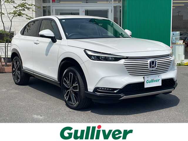 ホンダ ヴェゼル ハイブリッド e:HEV Z 青森県 2023(令5)年 2.2万km プラチナホワイトパール 4WD/ホンダコネクト純正9インチナビ・フルセグTV/BT/AppleCarPlay/iPod/マルチビューカメラ/合皮コンビシート/前席シートヒーター/ステアリングヒーター/ハンズフリーパワーバックドア/ワイヤレス充電器/前後ドライブレコーダー/ワイパーデアイサー/パドルシフト/ホンダセンシング/衝突軽減ブレーキ/追従クルーズコントロール/レーンキープアシスト/オートハイビーム/パーキングセンサー/ビルトインETC2.0/前後席USBジャック/フルLEDヘッドライト/純正18インチアルミ/純正フロアマット