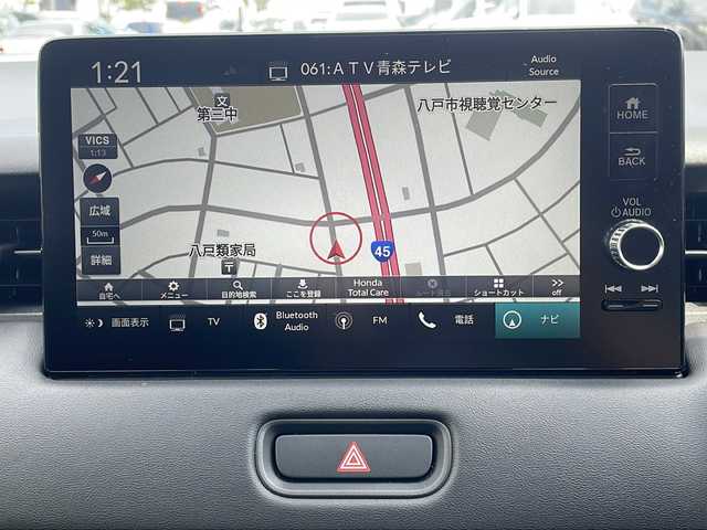 ホンダ ヴェゼル ハイブリッド e:HEV Z 青森県 2023(令5)年 2.2万km プラチナホワイトパール 4WD/ホンダコネクト純正9インチナビ・フルセグTV/BT/AppleCarPlay/iPod/マルチビューカメラ/合皮コンビシート/前席シートヒーター/ステアリングヒーター/ハンズフリーパワーバックドア/ワイヤレス充電器/前後ドライブレコーダー/ワイパーデアイサー/パドルシフト/ホンダセンシング/衝突軽減ブレーキ/追従クルーズコントロール/レーンキープアシスト/オートハイビーム/パーキングセンサー/ビルトインETC2.0/前後席USBジャック/フルLEDヘッドライト/純正18インチアルミ/純正フロアマット