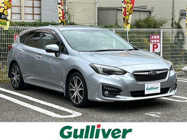 スバル インプレッサ スポーツ 2．0i－Lアイサイト 兵庫県 2016(平28)年 6.8万km アイスシルバーメタリック ワンオーナー/純正8型ナビ/CD/DVD/Bluetooth/フルセグTV/バックカメラ/アイサイトver3/OP　アドバンスドセイフティパッケージ/リアビークルディテクション/ハイビームアシスト/OP　クリアビューバック/LEDヘッドランプセット/ドライブレコーダー/ETC/パドルシフト/純正フロアマット/ドアバイザー/スマートキー/エンジンプッシュスタート/トノカバー/保証書/取説/スペアキー