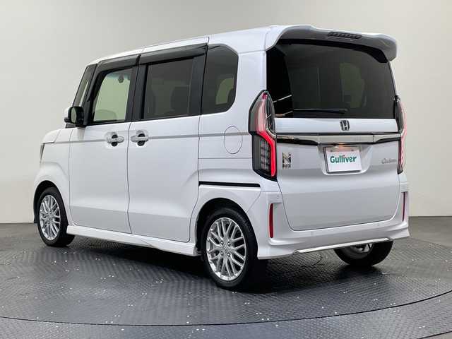 ホンダ Ｎ ＢＯＸ カスタム L ターボ 愛媛県 2021(令3)年 2.1万km プラチナホワイトパール 純正8型ナビ　ハーフレザーシート　両側電動スライドドア　ドライブレコーダー　コーナーセンサー　アダプティブクルーズコントロール　衝突被害軽減ブレーキ　シートヒーター　ＬＥＤヘッドライト　禁煙車