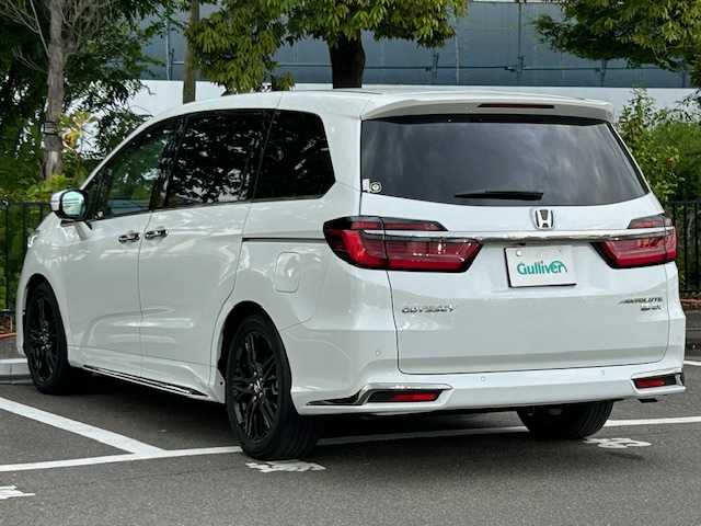 ホンダ オデッセイ ハイブリッド e:HEVアブソルート EX 宮城県 2021(令3)年 3.4万km プラチナホワイトパール 純正メモリナビ/フルセグTV/全方位カメラ/バックカメラ/両側パワースライドドア/パワーバックドア/クルーズコントロール/コーナーセンサー/ハーフレザーシート/シートヒーター/オットマン/プッシュスタート/１００V電源/アイドリングストップ/純正ETC2.0/EVモード