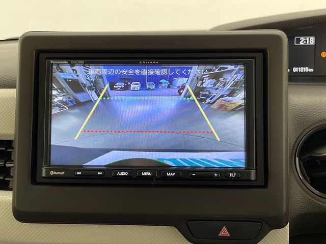 ホンダ Ｎ ＢＯＸ L 長野県 2023(令5)年 1.2万km ブリティッシュグリーンP 社外SDナビ（FM/AM/CD/Bluetooth/ワンセグTV）/HONDA SENSING/・衝突軽減ブレーキ/・先行車発進お知らせ機能/・路外逸脱抑制機能/・標識認識機能/・レーンキープアシスト/追従機能付きクルコン/電子パーキングブレーキ/オートブレーキホールド/プッシュスタート/アイドリングストップ/スマートキー/Wエアバッグ/ステアリングスイッチ/LEDヘッドライト/オートライト/ヘッドライトレベライザー/ドアバイザー/リアサンシェード/セカンドシートテーブル/純正フロアマット/純正ホイールキャップ付きスチールホイール/取扱説明書/スペアキー×1