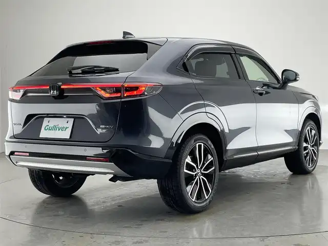 ホンダ ヴェゼル ハイブリッド e:HEV Z 愛知県 2021(令3)年 6.5万km メテオロイドグレーメタリック 純正９型ナビＴＶ　全方位カメラ　禁煙　ホンダセンシング　ハーフレザー　シートヒーター　電動リアゲート　ハンドルヒーター　ＢＳＭ　ＥＴＣ２．０　前後ドラレコ　衝突軽減　追従クルコン　ハンドル支援　ＬＥＤ　ワイヤレス充電