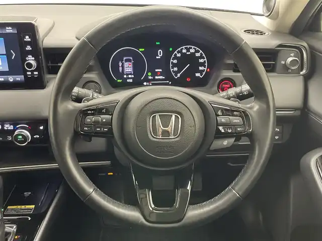 ホンダ ヴェゼル ハイブリッド e:HEV Z 愛知県 2021(令3)年 6.5万km メテオロイドグレーメタリック 純正９型ナビＴＶ　全方位カメラ　禁煙　ホンダセンシング　ハーフレザー　シートヒーター　電動リアゲート　ハンドルヒーター　ＢＳＭ　ＥＴＣ２．０　前後ドラレコ　衝突軽減　追従クルコン　ハンドル支援　ＬＥＤ　ワイヤレス充電