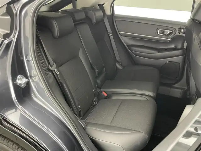 ホンダ ヴェゼル ハイブリッド e:HEV Z 愛知県 2021(令3)年 6.5万km メテオロイドグレーメタリック 純正９型ナビＴＶ　全方位カメラ　禁煙　ホンダセンシング　ハーフレザー　シートヒーター　電動リアゲート　ハンドルヒーター　ＢＳＭ　ＥＴＣ２．０　前後ドラレコ　衝突軽減　追従クルコン　ハンドル支援　ＬＥＤ　ワイヤレス充電