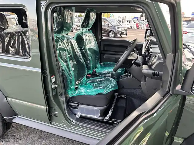 スズキ ジムニー ノマド FC 東京都 2025(令7)年 0.1千km ジャングルグリーン ワンオーナー/パートタイム4WD/衝突被害軽減ブレーキ/純正LEDオートライト/純正フォグ/純正セキュリティアラーム/アダプティブクルーズコントロール/レーンディパーチャーアラート/クリアランスソナー/ダウンヒルアシストコントロール/ウインカードアミラー/本革巻ハンドル/前席シートヒーター/オートエアコン/スマートキー/プッシュエンジンスタート/スペアキー/新車時保証書/取扱い説明書