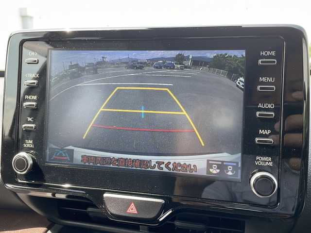 トヨタ ヤリスクロス ハイブリッド Z 愛媛県 2021(令3)年 2.8万km ホワイトパールクリスタルシャイン 純正ナビ/　(CD/DVD/USB/Bluetooth)/バックカメラ/ETC2.0/ステアリングスイッチ/レーダークルーズコントロール/プリクラッシュセーフティ/レーントレーシングアシスト/パーキングサポートブレーキ/ロードサインアシスト/前後コーナーセンサー/プッシュエンジンスタート/ハーフレザー調シート/前席シートヒーター/運転席パワーシート/純正フロアマット/ヘッドライトレベライザー/オートライト/オートハイビーム/LEDヘッドライト/ウィンカー付き電動格納ミラー/ドアバイザー