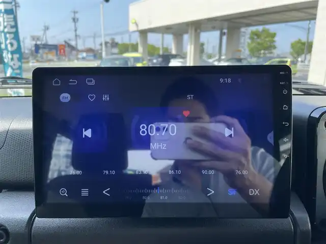 スズキ ジムニー XC 三重県 2024(令6)年 0.2万km ジャングルグリーン 登録時1315km/ワンオーナー/4WD/禁煙車/社外ディスプレイオーディオ/（AM/FM/Bluetooth/AppleCarPlay）/バックカメラ/シートヒーター/クルーズコントロール/ドラレコ/背面タイヤ/衝突軽減システム/レーンキープアシスト/コーナーセンサー/アイドリングストップ/プッシュスタート/純正アルミ/スペアキー