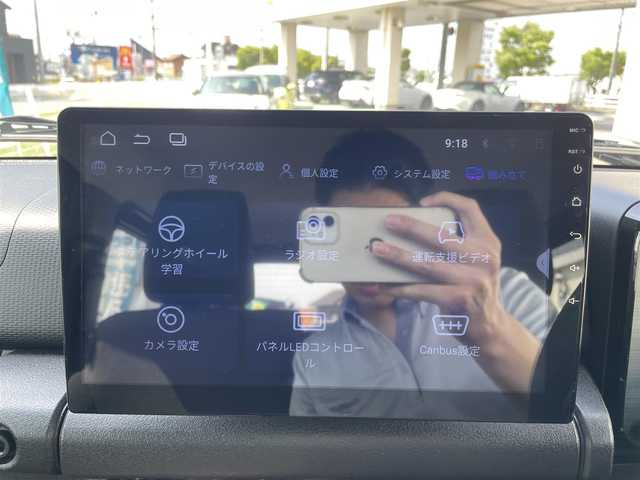スズキ ジムニー XC 三重県 2024(令6)年 0.2万km ジャングルグリーン 登録時1315km/ワンオーナー/4WD/禁煙車/社外ディスプレイオーディオ/（AM/FM/Bluetooth/AppleCarPlay）/バックカメラ/シートヒーター/クルーズコントロール/ドラレコ/背面タイヤ/衝突軽減システム/レーンキープアシスト/コーナーセンサー/アイドリングストップ/プッシュスタート/純正アルミ/スペアキー