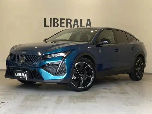 プジョー プジョー ４０８ GT 熊本県 2023(令5)年 1.7万km 青Ｍ ・ワンオーナー/・スマートキー/・プッシュスタート/・レーンキープアシスト/・パーキングセンサー/・リアクロストラフィックアラート/・アクティブセーフティブレーキ/・道路標識認識/・ドライバーアテンションアラート/・クルーズコントロール(追従式)/・ハーフレザーシート/・前席パワーシート/・前席シートヒーター /・純正メモリナビ/　【Bluetooth・USB・AppleCarPlay・AndroidAuto】/・全方位カメラ/・ETC/・ドライブレコーダー(前後録画)/・LEDヘッドランプ/・純正マット/・保証書/取説