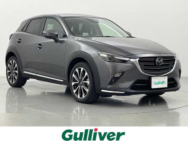 マツダ ＣＸ－３ 20SプロアクティブSパッケージ 熊本県 2018(平30)年 5万km マシーングレープレミアムM 純正ナビ（ＣＤ・ＤＶＤ・フルセグ・ＢＴ・ＡＵＸ）/バックカメラ　/ＥＴＣ　/レーダークルーズコントロール　/後ろのみコーナーセンサー　/前席シートヒーター　/ステアリングヒーター/運転席パワーシート/ブラインドスポットモニター　/衝突軽減ブレーキ/レーンキープアシスト/標識認識機能/アテンションアラート/横滑り防止/アイドリングストップ/ヘッドアップディスプレイ/ハーフレザーシート/社外フロアマット/純正１８インチAW/オートライト/LEDヘッドライト/フォグライト/スマートキー/プッシュスタート/保証書