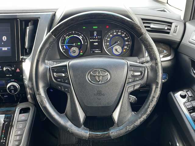 トヨタ アルファードハイブリット SR Cパッケージ 道東・釧路十勝 2016(平28)年 7.5万km スパークリングブラックパールクリスタルシャイン ・4WD/・モデリスタエアロ/・純正9インチディスプレイオーディオ/（ナビ・BT・CD・DVD・AUX・SD・USB・フルセグ）/・JBLプレミアムサウンド/・バックカメラ/・両側パワースライドドア/・パワーバックドア/・レーダークルーズコントロール/・衝突被害軽減ブレーキ/・クリアランスソナー/・横滑り防止装置/・パーキングアシスト/・前席シートヒーター/・前席パワーシート/・ステアリングスイッチ/・電動格納ミラー/・ETC/・レザーシート/・ステアリングヒーター/・LEDヘッドライト/・オートライト/・オートマチックハイビーム/・スマートキー/・プッシュスタート