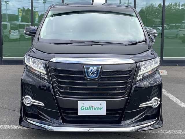 トヨタ アルファードハイブリット SR Cパッケージ 道東・釧路十勝 2016(平28)年 7.5万km スパークリングブラックパールクリスタルシャイン ・4WD/・モデリスタエアロ/・純正9インチディスプレイオーディオ/（ナビ・BT・CD・DVD・AUX・SD・USB・フルセグ）/・JBLプレミアムサウンド/・バックカメラ/・両側パワースライドドア/・パワーバックドア/・レーダークルーズコントロール/・衝突被害軽減ブレーキ/・クリアランスソナー/・横滑り防止装置/・パーキングアシスト/・前席シートヒーター/・前席パワーシート/・ステアリングスイッチ/・電動格納ミラー/・ETC/・レザーシート/・ステアリングヒーター/・LEDヘッドライト/・オートライト/・オートマチックハイビーム/・スマートキー/・プッシュスタート