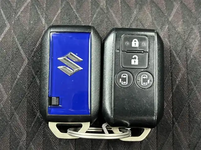 スズキ ソリオ バンディット HV MV 奈良県 2022(令4)年 2.5万km ピュアホワイトP 社外ナビ（AVIC-RL812）/（フルセグ／ＢＴ／ＣＤ／ＤＶＤ）/レーダークルーズコントロール/アラウンドビューモニター/後方コーナーセンサー/衝突軽減システム/レーンキープアシスト/両側パワースライドドア/前席シートヒーター/ヘッドアップディスプレイ/後席サンシェード/前後ドライブレコーダー（ZDR016）/ETC/純正15インチAW/スペアキーX1