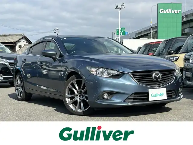 マツダ アテンザ セダン 25S Lパッケージ 愛知県 2014(平26)年 5.8万km ブルーリフレックスマイカ スマートキー/プッシュスタート/純正8インチナビ/TV/BT/バックカメラ/純正ETC/純正19インチAW/BOSEサウンドシステム/レーダークルーズコントロール/アイドリングストップ/レザーシート/パワーシート（D席メモリー付き）/前席シートヒーター/純正フロアマット