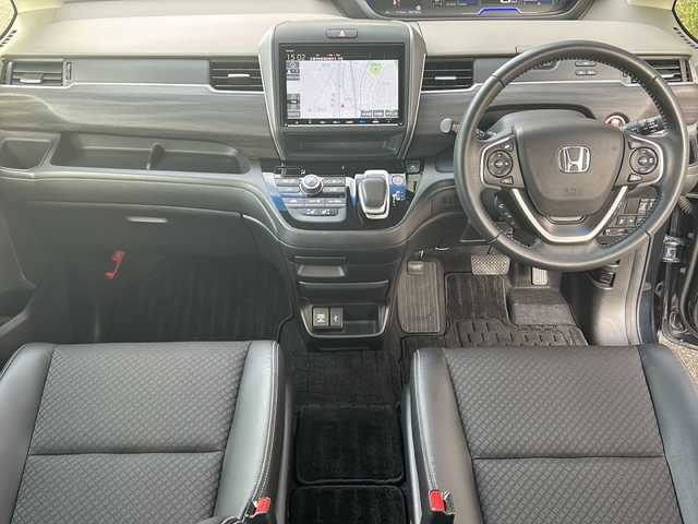 ホンダ フリード ハイブリット G ホンダセンシング 広島県 2020(令2)年 6.2万km ミッドナイトブルービームM 禁煙車/ワンオーナー/ホンダセンシング/・衝突軽減ブレーキ〈CMBS〉/・誤発進抑制機能/・ACC〈アダプティブ・クルーズ・コントロール〉/・LKAS〈車線維持支援システム〉/・行者事故低減ステアリング/・路外逸脱抑制機能/・先行車発進お知らせ機能/・標識認識機能/Cパッケージ/Sパッケージ/・本革巻ステアリングホイール/・コンビシート&専用インテリア/・15インチアルミホイール/・シートバックアッパーポケット/コンフォートビューパッケージ/純正９型ナビ(VXM-207VFNi)/・フルセグTV/CD/DVD/Bluetooth/SD/バックカメラ/両側パワースライドドア/ステアリングスイッチ/オートライト/LEDヘッドライト＋アクティブコーナリングライト/ハーフレザー/シートヒーター/スマートキー/プッシュスタート/純正ドライブレコーダー（DRH-204VD）/ETC/純正ドアバイザー/W+サイド+カーテンエアバック