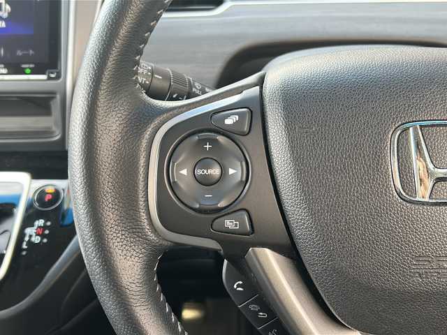 ホンダ フリード ハイブリット G ホンダセンシング 広島県 2020(令2)年 6.2万km ミッドナイトブルービームM 禁煙車/ワンオーナー/ホンダセンシング/・衝突軽減ブレーキ〈CMBS〉/・誤発進抑制機能/・ACC〈アダプティブ・クルーズ・コントロール〉/・LKAS〈車線維持支援システム〉/・行者事故低減ステアリング/・路外逸脱抑制機能/・先行車発進お知らせ機能/・標識認識機能/Cパッケージ/Sパッケージ/・本革巻ステアリングホイール/・コンビシート&専用インテリア/・15インチアルミホイール/・シートバックアッパーポケット/コンフォートビューパッケージ/純正９型ナビ(VXM-207VFNi)/・フルセグTV/CD/DVD/Bluetooth/SD/バックカメラ/両側パワースライドドア/ステアリングスイッチ/オートライト/LEDヘッドライト＋アクティブコーナリングライト/ハーフレザー/シートヒーター/スマートキー/プッシュスタート/純正ドライブレコーダー（DRH-204VD）/ETC/純正ドアバイザー/W+サイド+カーテンエアバック