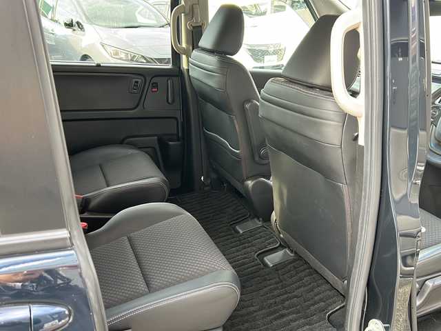 ホンダ フリード ハイブリット G ホンダセンシング 広島県 2020(令2)年 6.2万km ミッドナイトブルービームM 禁煙車/ワンオーナー/ホンダセンシング/・衝突軽減ブレーキ〈CMBS〉/・誤発進抑制機能/・ACC〈アダプティブ・クルーズ・コントロール〉/・LKAS〈車線維持支援システム〉/・行者事故低減ステアリング/・路外逸脱抑制機能/・先行車発進お知らせ機能/・標識認識機能/Cパッケージ/Sパッケージ/・本革巻ステアリングホイール/・コンビシート&専用インテリア/・15インチアルミホイール/・シートバックアッパーポケット/コンフォートビューパッケージ/純正９型ナビ(VXM-207VFNi)/・フルセグTV/CD/DVD/Bluetooth/SD/バックカメラ/両側パワースライドドア/ステアリングスイッチ/オートライト/LEDヘッドライト＋アクティブコーナリングライト/ハーフレザー/シートヒーター/スマートキー/プッシュスタート/純正ドライブレコーダー（DRH-204VD）/ETC/純正ドアバイザー/W+サイド+カーテンエアバック