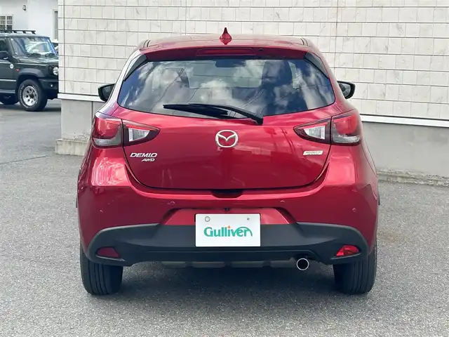 マツダ デミオ 15Sツーリング 山形県 2018(平30)年 4.3万km ソウルレッドクリスタルM ４WD/純正ナビ/FM/AM/Bluetooth/スマートシティブレーキサポート/BSMシステム/車線逸脱防止装置/横滑り防止装置/バックカメラ/AUTOライト/スペアキー/スマートキー/ダブルエアバック/冬タイヤ積載　WZ-1/取扱説明書/保証書