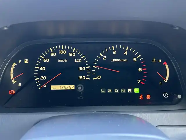 トヨタ ランドクルーザー プラド TX－LTD ワイド 福岡県 2001(平13)年 13.9万km ホワイト/シルバーM 社外ナビ【カロッツェリア　AVIC-MRZ09】　/　フルセグＴＶ・Ｂｌｕｅｔｏｏｔｈ・ラジオ・ＣＤ　/3列シート/背面タイヤ/ドアバイザー/純正フロアマット　/電動パワーアンテナ　/ルーフレール　/純正アルミホイール　/パワーステアリング　/パワーウィンドウ/リモコンキー/スペアキー2本/運転席・助手席エアバッグ/取扱説明書