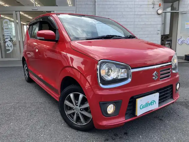 スズキ アルト ターボRS 埼玉県 2015(平27)年 4.9万km ピュアレッド 社外ナビオーディオ（Carrozzeria）/型番：AVIC-ZH0099W/（フルセグTV/BT/DVD/CD/FM/AM）/純正15インチAW付きサマータイヤあり/AW:ENKEI/タイヤ：ブリジストン POTENZA/パドルシフト/ステアリングリモコン/バックカメラ/シートヒーター/衝突被害軽減ブレーキ/アイドリングストップ/横滑り防止機能/プッシュスタート/スマートキー（スペアキーあり）/ストラットタワーバー/KYBショックアブソーバー/フォグライト/ドアバイザー/電動格納ミラー/車両・ナビ取説あり