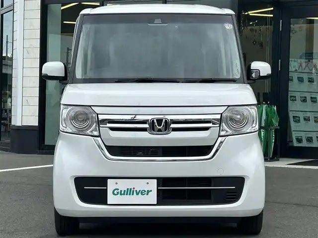 ホンダ Ｎ ＢＯＸ L 愛媛県 2023(令5)年 1.1万km プラチナホワイトパール Strada7型ナビ(BT/フルセグTV)/バックカメラ/片側電動スライドドア/ホンダセンシング/アダプティブクルーズコントロール/バックソナー/前後ドライブレコーダー/前席シートヒーター/LEDヘッドライト/オートライト/オートマチックハイビーム/アイドリングストップ/電動パーキングブレーキ/ステアリングリモコン/電格ミラー/後席サンシェイド/シガーソケット/純正ホイールキャップ/現状サマー(鉄)(155/65/R14)/DUNLOP ENASAVE EC300