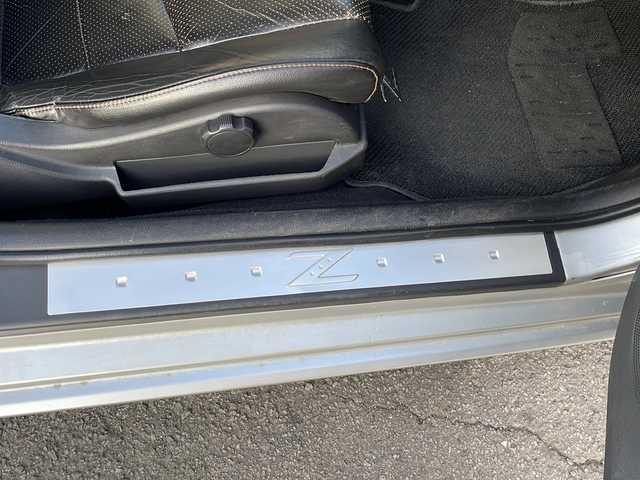 日産 フェアレディ Ｚ バージョンT 宮崎県 2004(平16)年 12.2万km ダイヤモンドシルバー SDナビ/フルセグテレビ/Bluetooth/CDチェンジャー/DVD再生可/ETC/LEDヘッドライト/パワーウィンドウ/パワーステアリング/TCS/マフラーＹｏｓｓｏ