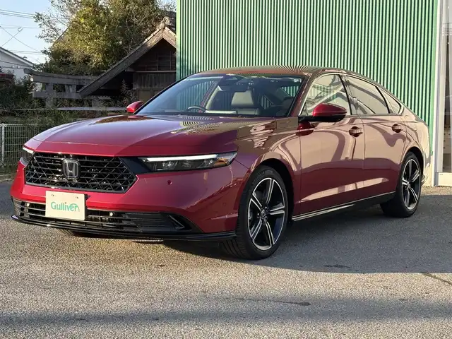 ホンダ アコード e:HEV 福岡県 2024(令6)年 1.1万km 赤 Hondaコネクトディスプレー/(フルセグテレビ・FM・AM・BT)/ETC2.0/クルーズコントロール/前席パワーシート/全席シートヒーター/ブラインドスポットモニター/純正フロアマット/全方位モニター/レーンキープアシスト/衝突軽減ブレーキ/車線維持支援システム/Apple CarPlay
