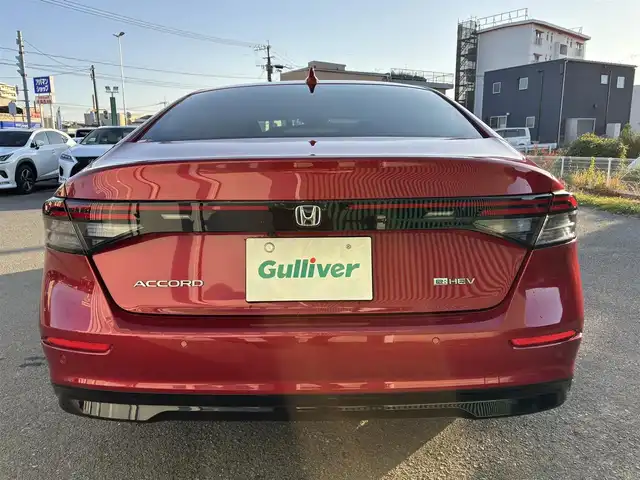 ホンダ アコード e:HEV 福岡県 2024(令6)年 1.1万km 赤 Hondaコネクトディスプレー/(フルセグテレビ・FM・AM・BT)/ETC2.0/クルーズコントロール/前席パワーシート/全席シートヒーター/ブラインドスポットモニター/純正フロアマット/全方位モニター/レーンキープアシスト/衝突軽減ブレーキ/車線維持支援システム/Apple CarPlay