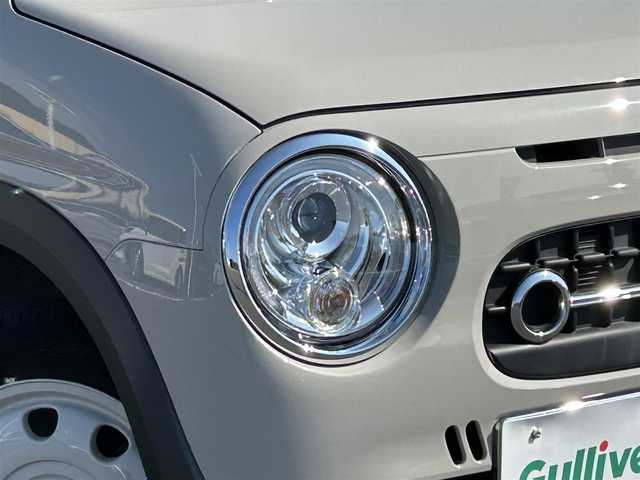 スズキ ラパン ＬＣ X 島根県 2023(令5)年 1.4万km フォーンベージュメタリック/アーバンブラウン 2トーン ワンオーナー/純正ディスプレイオーディオ/(AM/FM/USB/Bluetooth)/バックカメラ/ビルトインETC/リアパーキングセンサー/車線逸脱警報/デュアルカメラカメラブレーキサポート/横滑り防止装置/革巻きステアリング/ステアリングスイッチ/プッシュスタート/スマートキー/純正フロアマット/ドアバイザー/純正14インチアルミホイール/取扱説明書/保証書